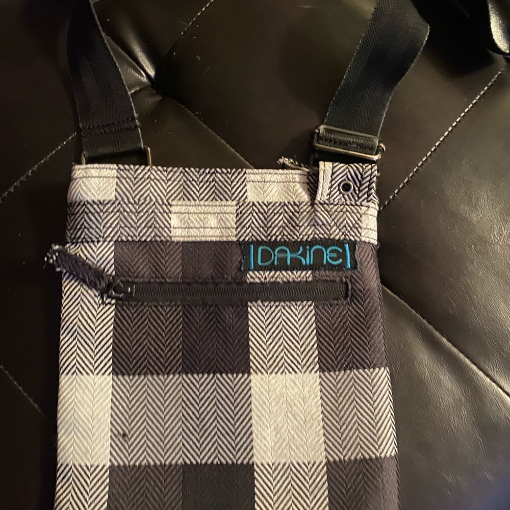 Like new, smaller size Dakine black and white plaid crossbody bag